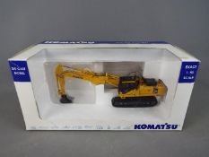 Universal Hobbies - A boxed diecast 1:50 scale Komatsu PC450 Excavator with Short Trowel.