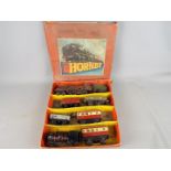 Hornby - A boxed Hornby O Gauge Goods Set. Lot contains Two clockwork locos (0-2-0 Op.No.