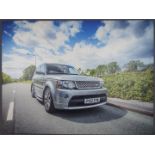 A photograph of a Range Rover printed on canvas,