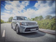 A photograph of a Range Rover printed on canvas,