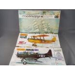 Matchbox, Revell - Three boxed model kits in various scales.