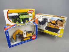 Joal, Siku - A collection of three boxed diecast 1:50 scale scale construction vehicles.