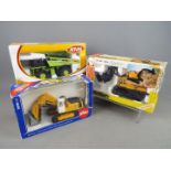 Joal, Siku - A collection of three boxed diecast 1:50 scale scale construction vehicles.