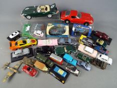 Ertl, Corgi, Bburago, Solido, Others - A collection of mainly unboxed diecast,