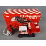 Conrad - A boxed 1:50 scale diecast Conrad #2771 O&K RH120C Hydraulic Tracked Excavator.