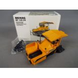NZG - A boxed diecast 1:50 scale NZG #395 Demag DF 140 CS Road Finisher.