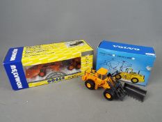 Scoop, First Gear - Two boxed diecast 1:50 scale construction vehicles.