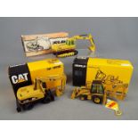 NZG - A collection of three boxed diecast 1:50 scale scale construction vehicles by NZG.