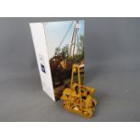 Conrad - A boxed Conrad # 2875/01 1:50 scale diecast Caterpillar 583 Pipelayer Spiecapag.