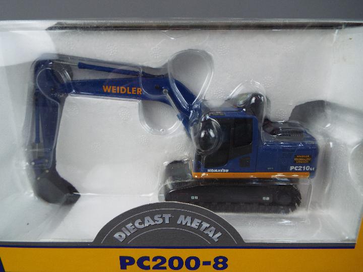 NZG - A boxed diecast 1:50 scale NZG #804 Komatsu PC210LC 'Wiedler' Crawler Excavator. - Image 2 of 3