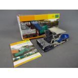 NZG - A boxed diecast 1:50 scale NZG #671 Vogele Super 1900-2 Tracked Paver.