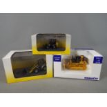 Universal Hobbies - Three boxed diecast construction vehicles in 1:50 scale from Universal Hobbies.