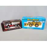 Ertl - Two boxed diecast construction vehicles in 1:50 scale by Ertl.