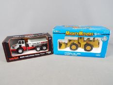 Ertl - Two boxed diecast construction vehicles in 1:50 scale by Ertl.
