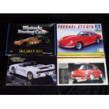 Four boxed 1:24 scale model kits of sports / racing cars to include Fujimi Porsche 911 Carrera '85