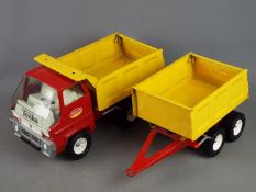 Tonka - An unboxed vintage Tonka Gas Turbine Tipper and Trailer.