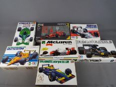 Seven boxed model kits of racing cars by Tamiya, Hasegawa,