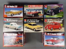 AMT ERTL, Revell - Eight boxed 1:25 model kits of American cars to include '65 Pontiac GTO,