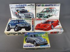 Tamiya - Five boxed 1:20 and 1:24 scale model kits to include Ferrari F50, Fiat 131 Abarth Rally,