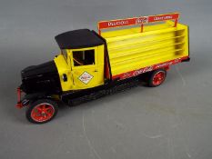 Coca Cola - a Danbury Mint 1:24 scale diecast model of a 1928 Coca Cola delivery truck,
