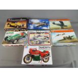 A collection of Eduard, Tamiya, Ehmar, AMT kits, - Tamiya Lotus Super 7 Series II Cosworth,