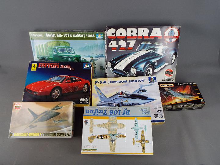 Italeri, Eduard, Trumpeter, Airfix, Others - Seven boxed plastic model kits in various scales.