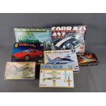 Italeri, Eduard, Trumpeter, Airfix, Others - Seven boxed plastic model kits in various scales.
