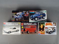 Monogram, AMT - Five boxed plastic model car kits in various scales.