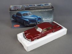 Kyosho - A boxed 1:18 scale diecast Tucker Torpedo by Kyosho.