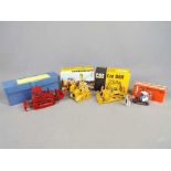 Conrad, NZG, Old Cars - Four boxed diecast construction vehicles in 1:50 scale.