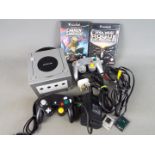 Nintendo - An unboxed Nintendo Gamescube console, with two controllers, power supply ,