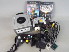 Nintendo - An unboxed Nintendo Gamescube console, with two controllers, power supply ,