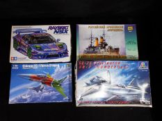 Tamiya, Trumpeter, Zvezda; Italeri - Four boxed plastic model vehicle kits in various scales.