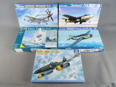 Five boxed model kits in varying scales comprising a 1:48 scale Trumpeter FGA.Mk.