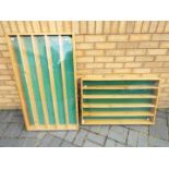 Two wooden display cabinets The large cabinets measures approximately 62cms (H) x 110cms (W) x