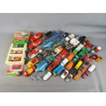 A collection of unboxed, playworn diecast model vehicles to include Dinky, Matchbox, Corgi,