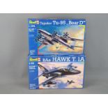 Revell -Two boxed plastic model kits by Revell in various scales.