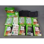 Subbuteo - A collection of 10 boxed Subbuteo football teams plus 4 boxed Subbuteo accessories.