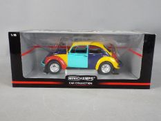 Minichamps - A boxed 1:18 scale diecast Volkswagen 1200 Beetle 'Harlequin' from Minichamps.