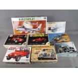 A selection of model kits by Tamiya, Monogram,