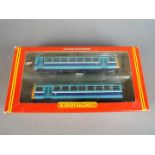 Hornby - A boxed Hornby R867 OO gauge Class 142 Pacer Diesel Twin Railbus set Op.No.