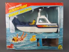 Fisher price - A boxed vintage Fisher Price Adventure #334 Shark Patrol Play set.