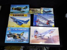 Hasegawa, Italeri, Airfix, Revell - Seven boxed plastic model aircraft kits in various scales.