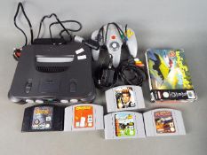 Nintendo - An unboxed Ninendeo 64 Games Console, with power supply console,