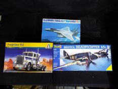 Tamiya, Revell, Italeri - Three boxed plastic model kits in various scales.