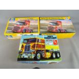 Three boxed model kits in 1:24 and 1:25 scale to include two Italeri Volvo FH-16 Globetrotter XL