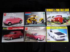 Six boxed model kits of classic American vehicles in 1:24 and 1:25 scale to include a Monogram '69