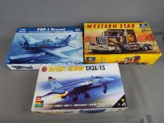 A collection of model kits including Italeri,