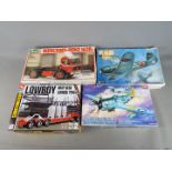 Revell, Doyusha, AMT Ertl and Academy - 4 Boxed Plastic Model Kits in various scales.