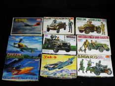 Tamiya, Minicraft, ICM, Hobby Boss, - Nine boxed plastic model vehicle kits in various scales.